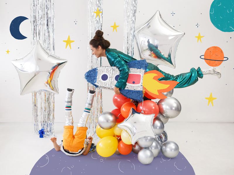 Rocket piñata styled